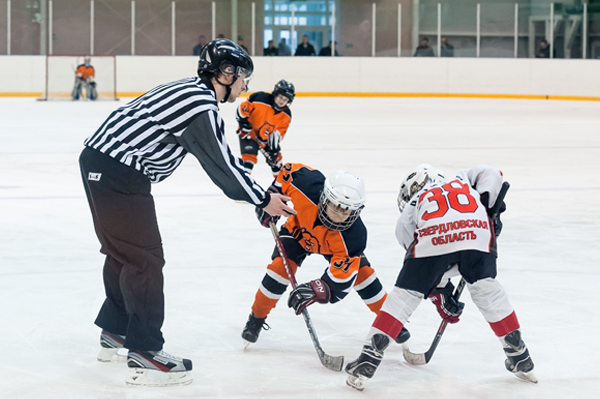 Hockey Players Facing Off