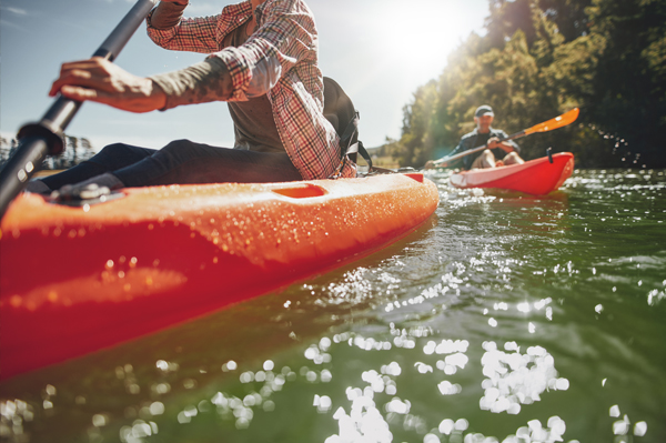 Couple Kayaking in the Sun